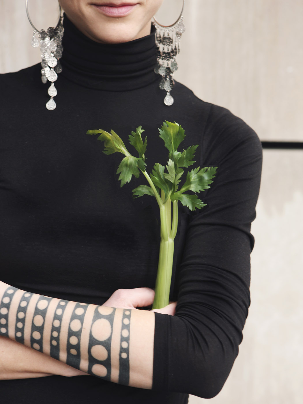 business-assessment-woman-celery-tattoos-playground-hospitality-doug-roth celery in hand